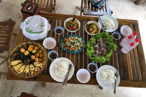 Eat with locals at a Khmer silk farm